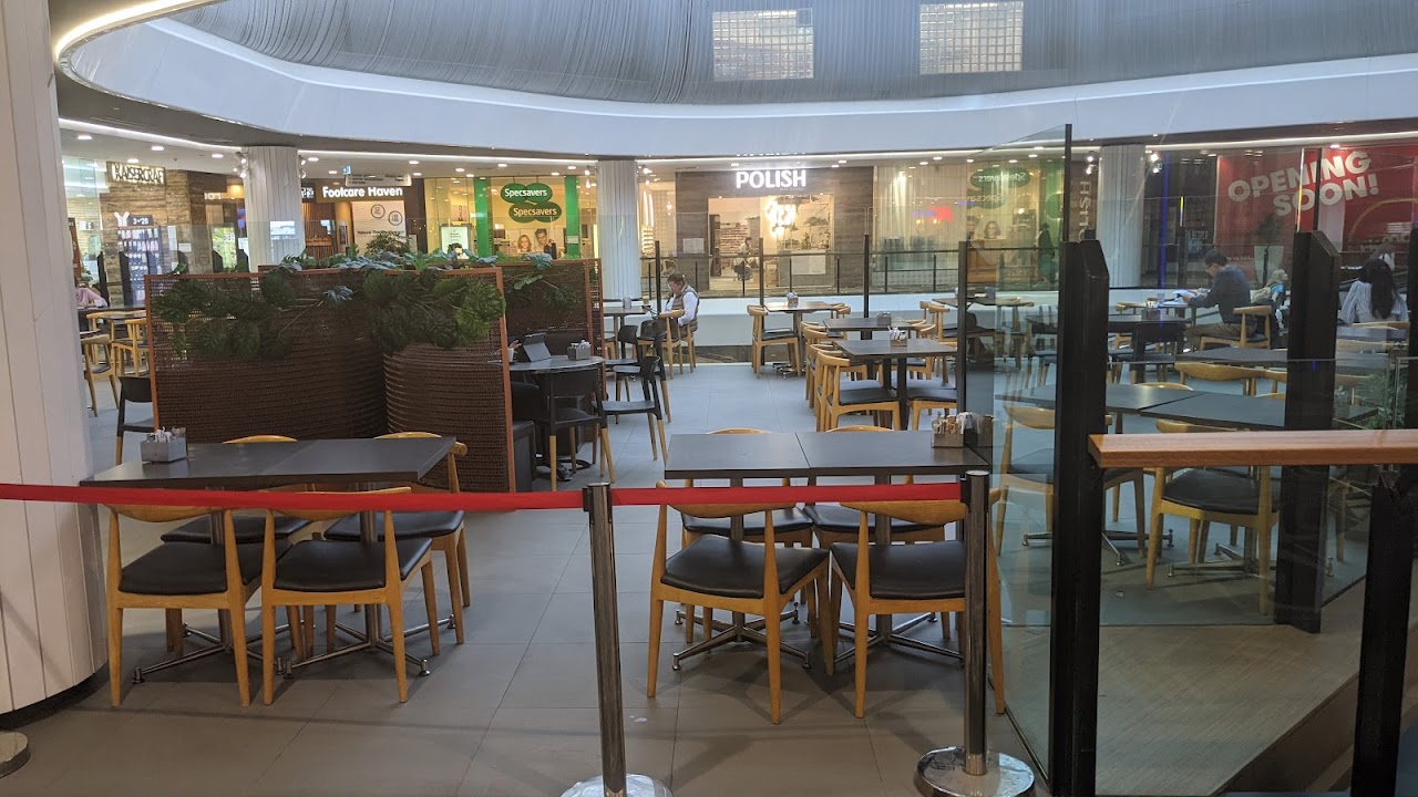 Seating area at Chatterbox Cafe in Toowong Village