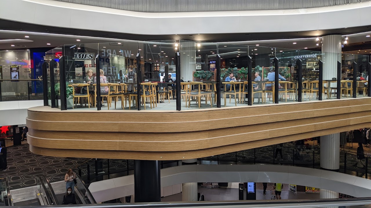 Upper level view toward Chatterbox Cafe seating